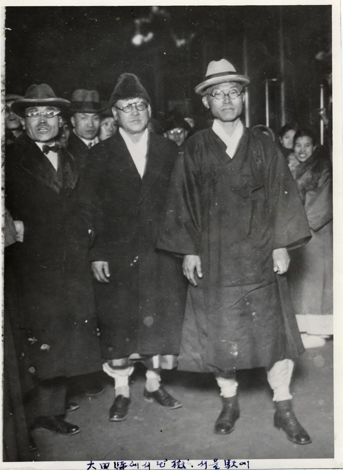 Dosan Ahn Chang-ho photographed with others on his arrival to visit friends after four years of imprisonment